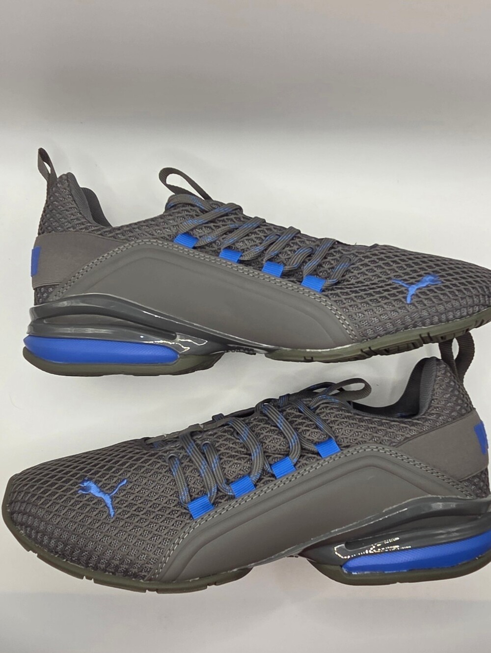 Puma Axelion Spark Men's Gray Sneakers with Blue Accents